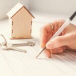 mortgage and housing rent. Keys, house and hand that signs documents