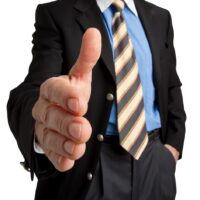 Deal per Handschlag - Geschäftsmann Deal per Handschlag - Geschäftsmann