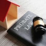 Toy house, gavel and text PROBATE LAW. Real estate and law concept